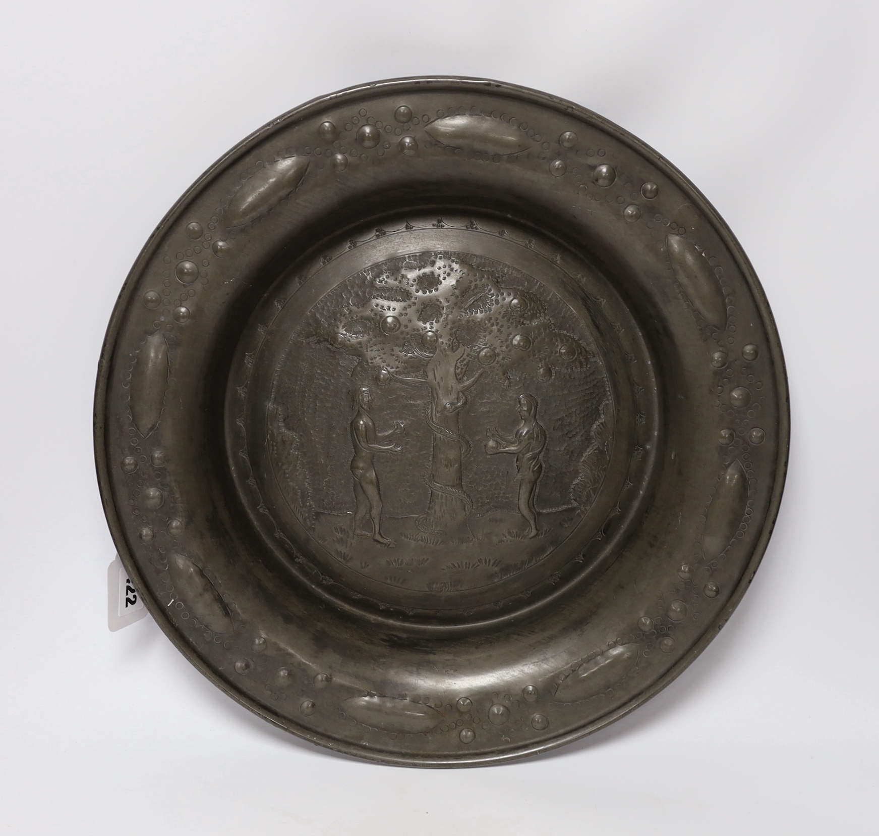 A large North European pewter 'Adam and Eve' alms dish, possibly Nuremberg 18th/19th century, impressed J mark, 40cm